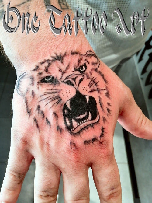 tete de lion - one tattoo art